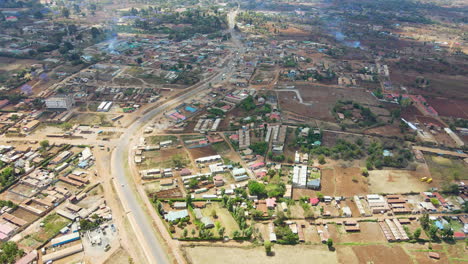 Aerial-overview-of-a-beautiful,-small-town-in-rural-Kenya