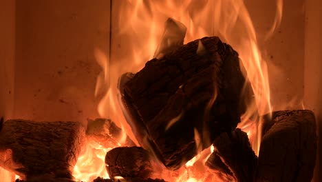 cold-winter-season-concept-heating-during-big-economical-crisis-close-up-of-fire-burning-wood-at-home