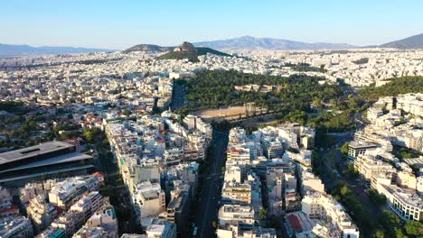 Acropolis-city-of-Athens-parthenon,-symbol-of-ancient-Greece,Mount-Lycabettus,-Parliament-Building,-residential-buildings