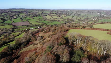 Aerial-panning-left-shot-of-the-beautiful-East-Devon-Countryside-looking-over-Dumpdon-Hill-in-the-Blackdown-Hills-England