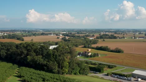 Aerial-of-drone-delivering-package-in-rural-countryside