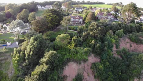 Luftaufnahme-Von-Häusern-Auf-Einer-Klippe-In-Der-Nähe-Von-Seaton,-Devon,-England