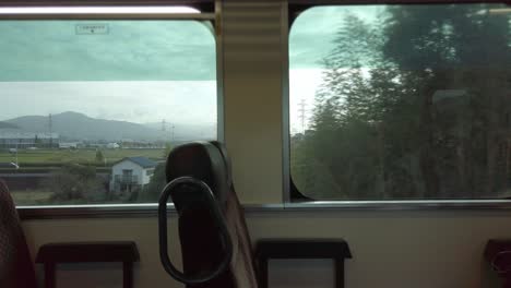view-inside-local-railway-train-while-moving-operating-with-empty-seat-without-passenger-in-daytime