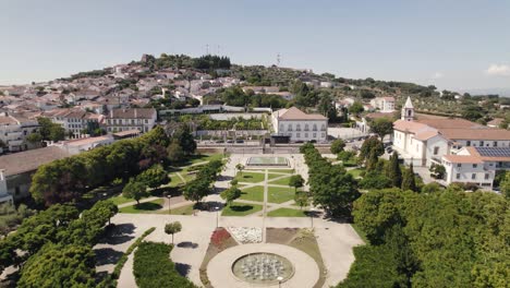 Empty-municipal-garden-and-Episcopal-Palace-in-background,-Castelo-Branco-in-Portugal