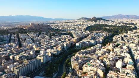 City-center-of-Athens,-residential-buildings,-aerial-view-at-sunrise-time