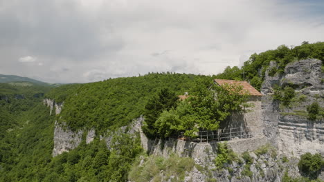 Orthodox-Katskhi-monastery-on-top-of-tall-rock-pillar-cliff-in-Georgia