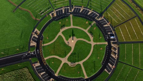 Modern-circular-cemetery-pathway-design-aerial-view-artistic-garden-of-rest-slowly-descending-from-above