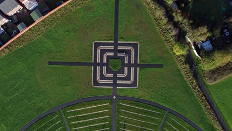 Modern-square-target-cemetery-pathway-design-aerial-top-view-descending-above-artistic-garden-of-rest-graveyard