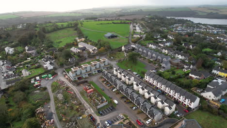 Aerial-View-of-Kinsale,-Cork-County,-Ireland,-Row-Houses-in-Residential-Area-Above-Brandon-River-Bay,-Drone-Shot