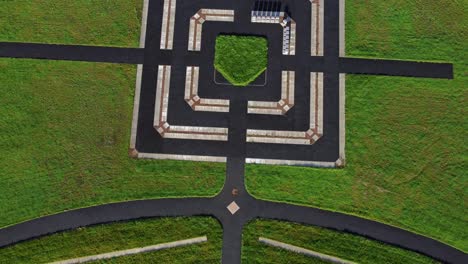 Modern-square-target-cemetery-pathway-design-aerial-rising-Birdseye-view-artistic-garden-of-rest-graveyard