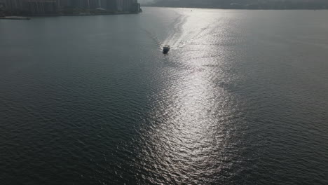 Sailing-tourism-Boat-on-the-water-in-the-city-in-Hong-Kong,-China