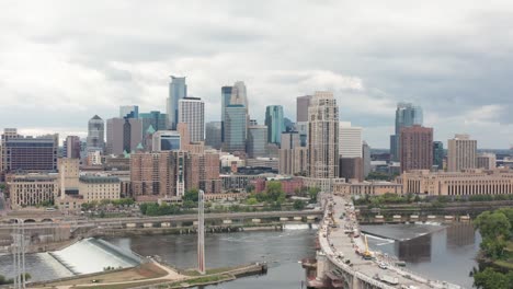 Aerial-of-Minneapolis-skyline-with-view-of-Saint-Anthony-Falls-and-Central-Ave-Bridge