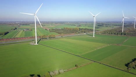 Vista-Aérea-De-Drones-De-Las-Granjas-De-Turbinas-Eólicas-En-Los-Países-Bajos,-Europa