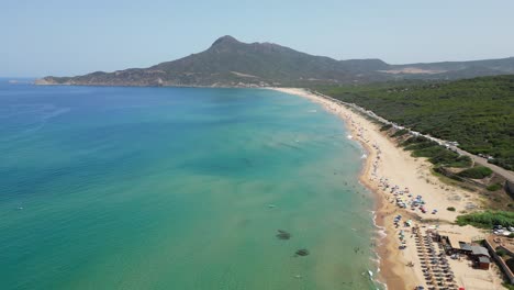 Long-White-Sandy-San-Nicolo-Beach-in-Buggerru,-Sardinia,-Italy---4k-Aerial