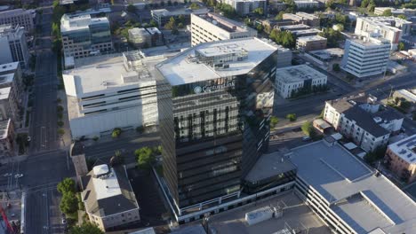 Rising-aerial-view-of-the-CenturyLink-headquarters-in-Salt-Lake-City,-Utah