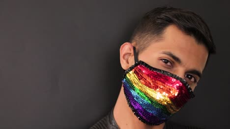 Hispanic-model-wearing-an-rainbow-sequin-face-mask