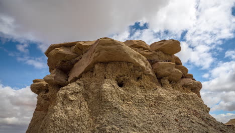 Time-Lapse,-Clouds-Moving-Above-Hoodoo-Rock-in-Bisti-Badlands-De-Na-Zin-Wilderness,-New-Mexico-USA
