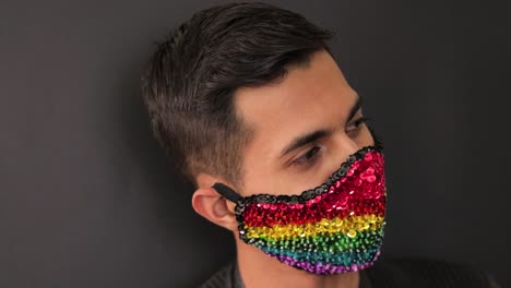 Latin-model-wearing-an-rainbow-sequin-face-mask