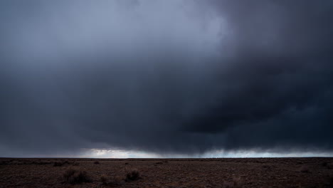 Time-Lapse-of-Dark-Stormy-Clouds-Moving-Above-Desert-Landscape,-Climate-Change,-Global-Warming-Concept