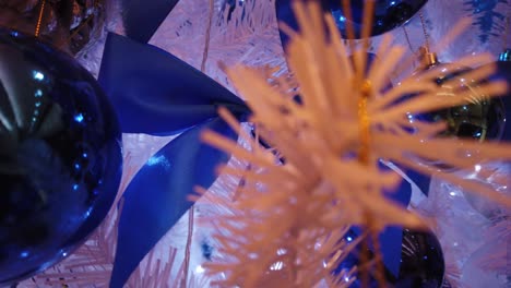 Stabilized-extreme-close-up-movements-across-beautiful-blue-themed-Christmas-tree-version-five