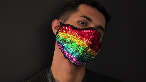 Hispanic-model-wearing-an-rainbow-sequin-face-mask