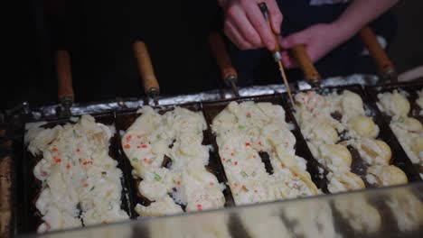 Japanese-Takoyaki,-Octopus-Dumplings-being-cooked-on-streets-of-Osaka
