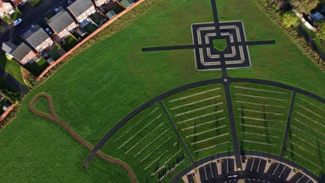 Modern-circular-cemetery-pathway-design-aerial-view-artistic-garden-of-rest-flying-above-pattern