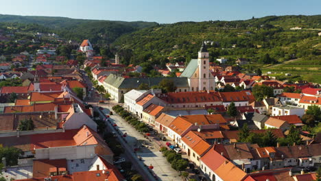 Rotating-drone-shot-of-the-Church-of-Holy-Trinity-in-Svätý-Jur-or-Saint-George-in-Bratislava