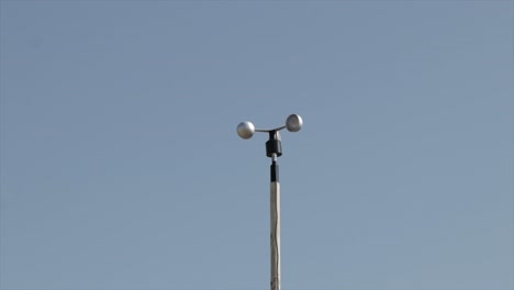 Anemometer-spinning-on-the-wind-measuring-the-wind-speed-and-direction