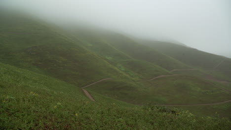 Panning-left-to-right-shot-of-a-mountainous-region-in-Lomas-de-Manzano,-Pachacamac,-Lima,-Peru