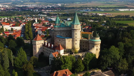 Cinematic-rotating-drone-shot-of-Castle-Of-Spirits-or-Bojnice-Castle-in-Slovakia
