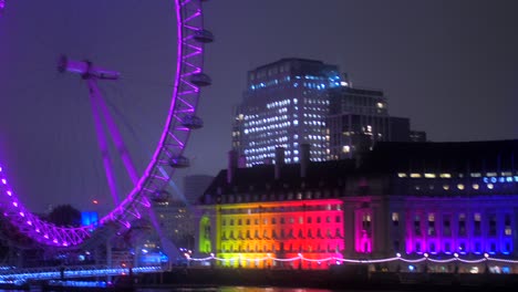 County-Hall-And-London-Eye-With-Colorful-Illuminations-At-Night-On-The-Bank-Of-River-Thames-In-London,-UK
