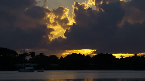 Dramatic-Clouds-Over-Moored-Boat-In-South-Florida-Inlet