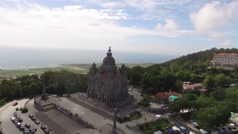Santa-Luzia-church-sanctuary-drone-aerial-view-in-Viana-do-Castelo-with-city-on-the-background,-in-Portugal