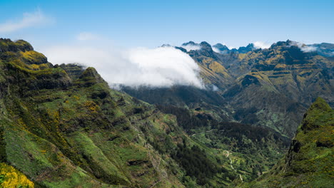 4K-timelapse-as-clouds-move-over-lush-green-mountain-valley,-Madeira-Portugal