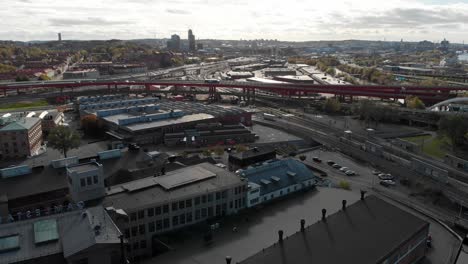 Aerial-pullback-revealing-Gamlestaden-cityscape-views,-Gothenburg---Sweden