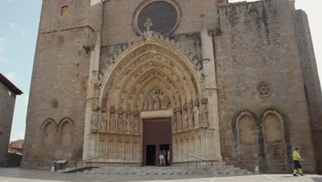 Front-View-And-Entrance-Of-Santa-Maria-Basilica-In-Castello-d'Empuries-in-Girona-province,-Catalonia,-Spain