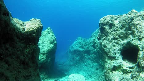 Underwater-exploring-in-clear-waters-of-Kefalonia,-Greece