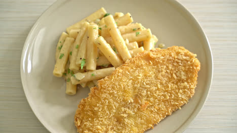 homemade-quadrotto-penne-pasta-white-cream-sauce-with-fried-fish