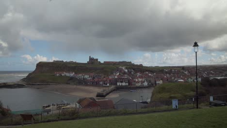 Whitby-harbour-with-Whitby-abbey-in-background-on-a-cloudy-overcast-day