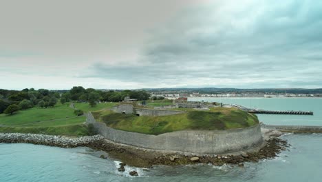 Aerial-View-Of-Weymouth's-Historic-Nothe-Fort-On-A-Cloudy-Day-In-Dorset,-UK---drone-shot