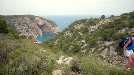 Woman-Hiking-Near-Costa-Brava-Coast-In-Spain---L'Estartit-Area-In-Costa-Brava,-Spain---wide,-static-shot