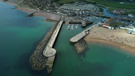 Bridport-Harbour-and-West-Bay-Beach-on-Coast-of-Dorset,-England---Aerial