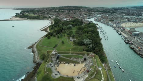 Aerial-View-Of-Nothe-Fort,-Weymouth's-Historic-Sea-Fort-on-the-Jurassic-Coast---drone-shot