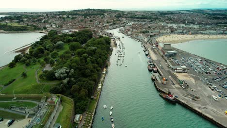 Nothe-Fort-And-Harbor-In-Weymouth,-England---aerial-pullback