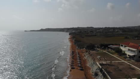 Panoramic-View-Of-The-Resort-Building-At-The-Shoreline-Of-Megas-Lakkos-Beach-In-Greece