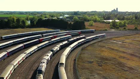 Aerial-view-of-railway-sidings-with-trains-and-locomotives