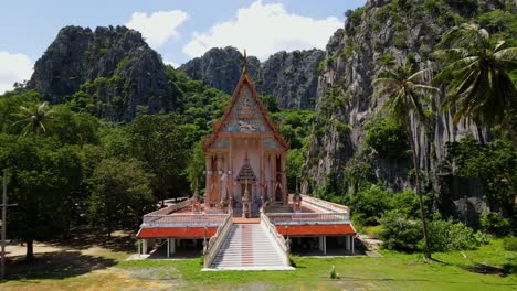 An-aerial-footage-towards-this-gorgeous-Buddhist-temple-in-between-limestone-mountains