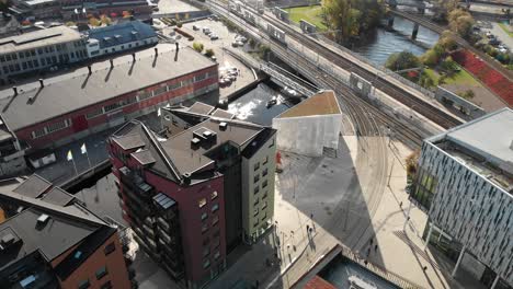 River-and-Boat-in-Gamlestaden-or-Old-City-Urban-District,-Gothenburg,-Sweden,-Aerial