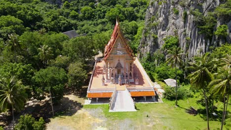 Reverse-aerial-footage-from-the-top-of-the-temple-revealing-the-whole-structure-and-the-beautiful-landscape